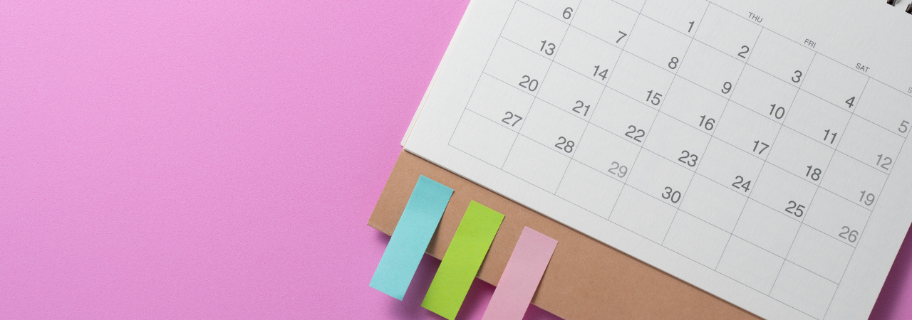 pink background with calendar shown on right side, and small colourful post-its