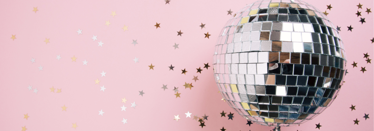 pink background with silver confetti and disco ball